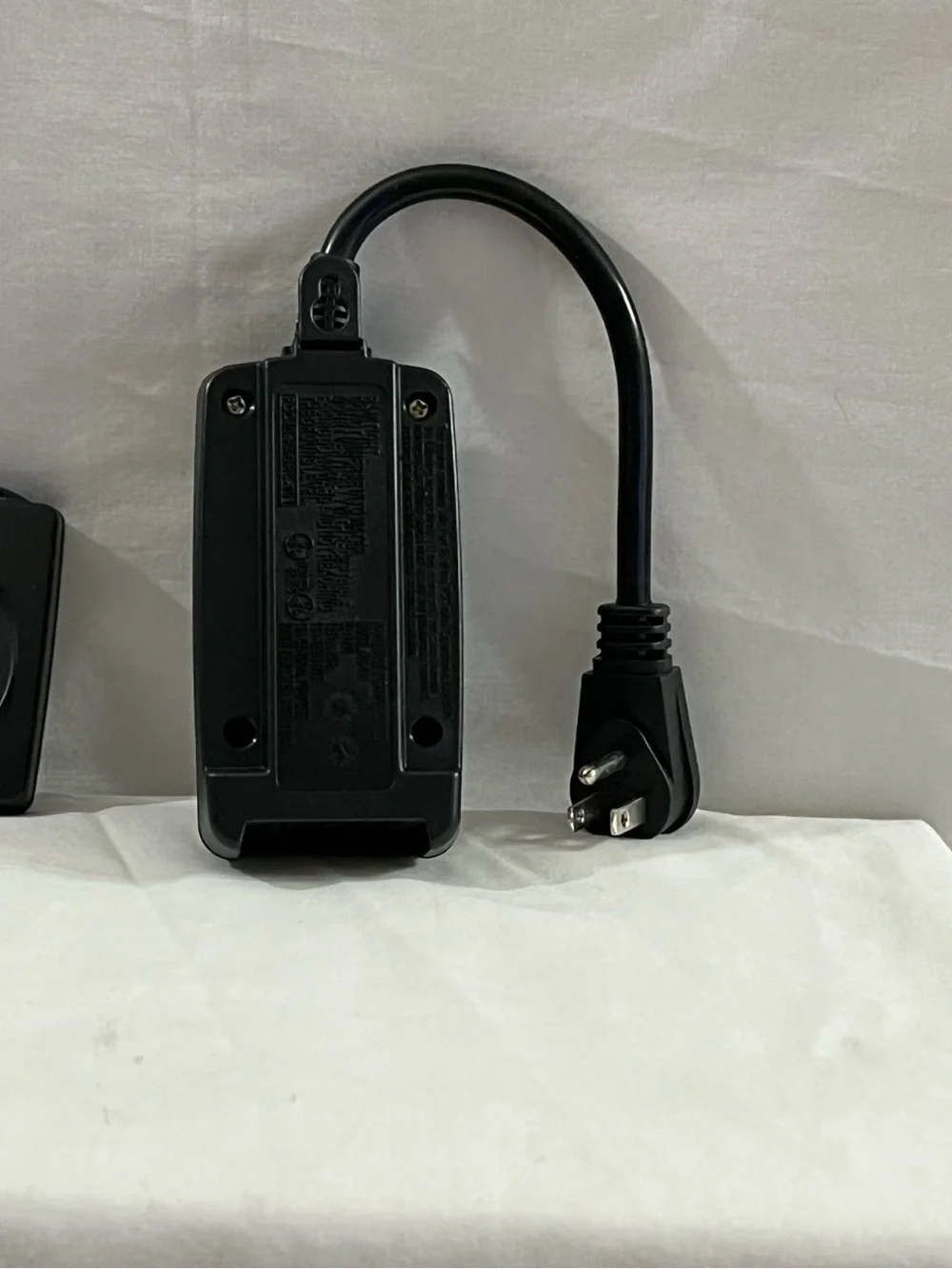 Black Remote and Power Adapter Set